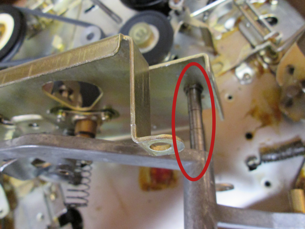 Closeup of pivot point spindle with lever arm partially removed